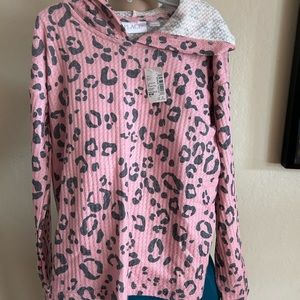 Place pullover new with tag